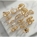 25-Piece Gold-Tone Fashion Ring Set with Faux Pearls, Cubic Zirconia, and Geometric Motifs