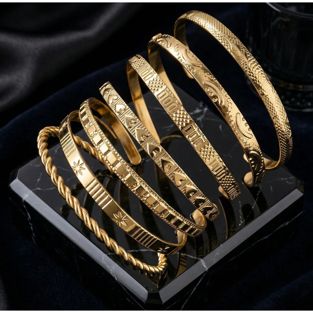8-Piece Gold-Tone Textured Bangle Set with Twisted, Engraved, and Star Motif Designs