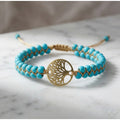 Double-Strand Turquoise-Tone Bead Bracelet with Gold-Tone Tree Pendant and Braided Cord